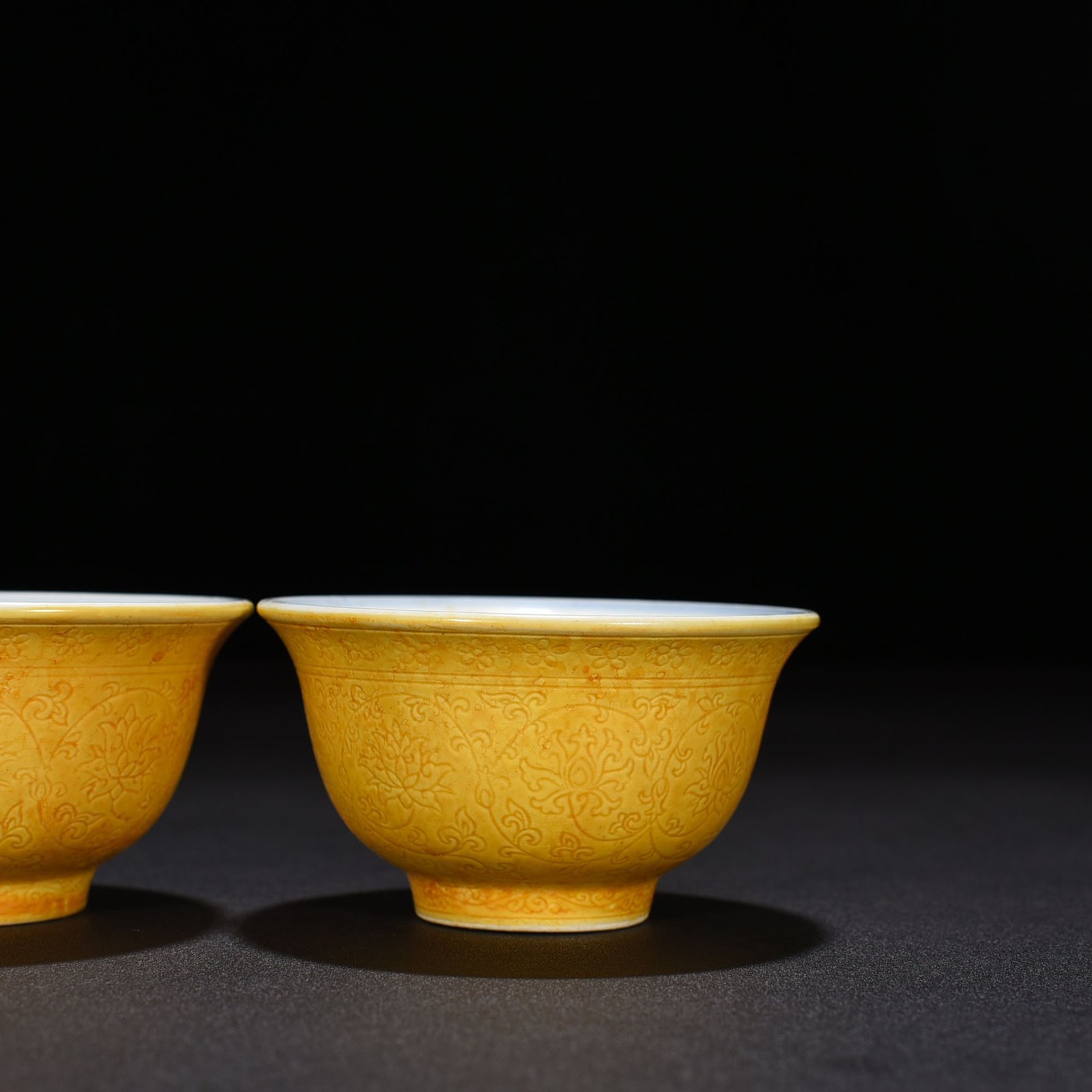 Ming Dynasty Yongle delicate yellow glaze carved lotus pressed hand cup