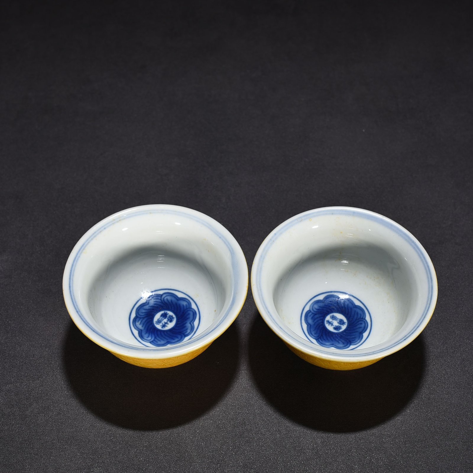 Ming Dynasty Yongle delicate yellow glaze carved lotus pressed hand cup
