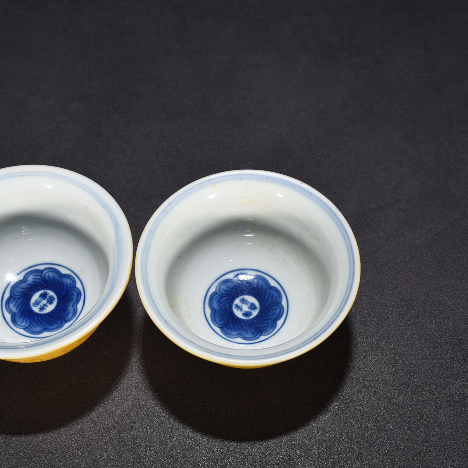 Ming Dynasty Yongle delicate yellow glaze carved lotus pressed hand cup