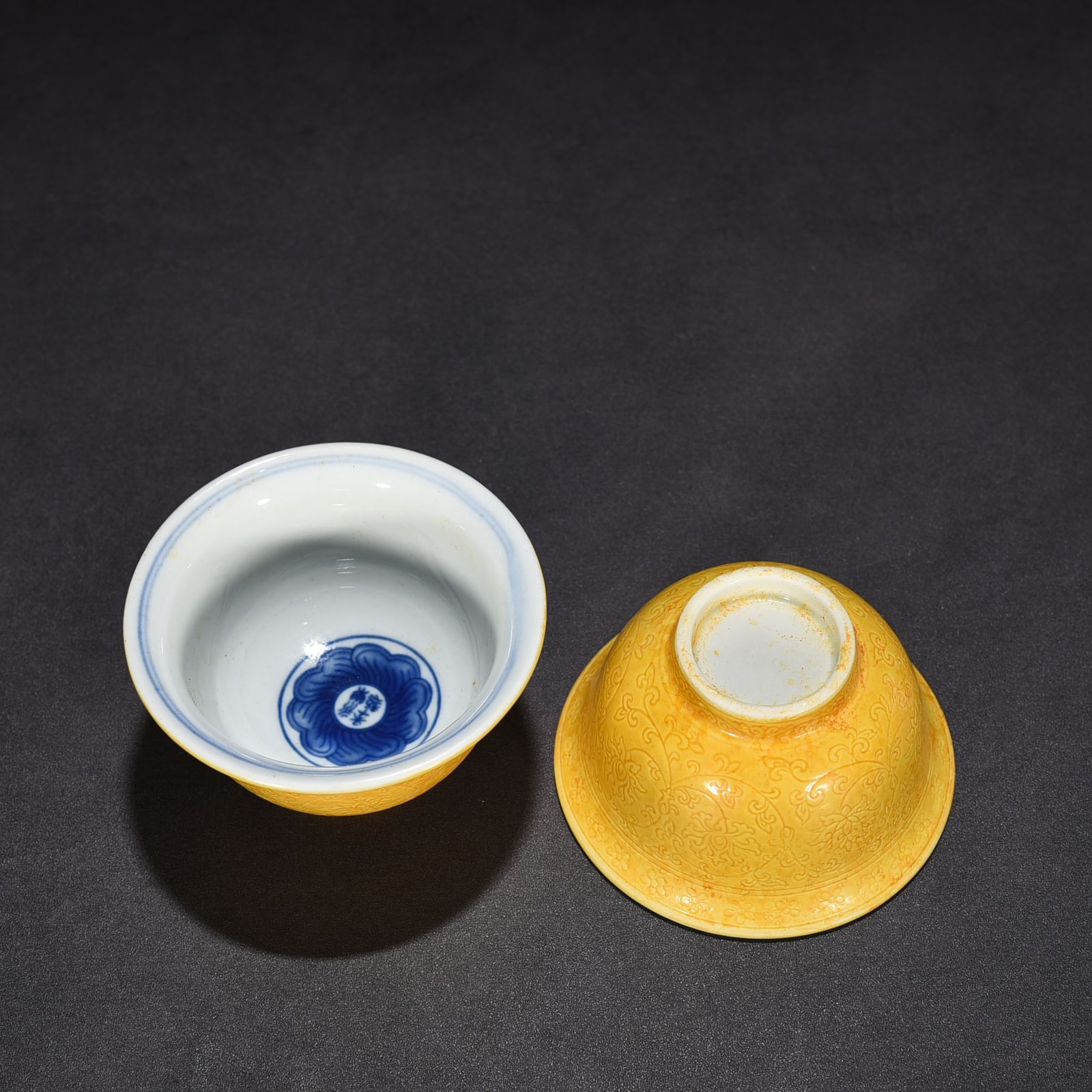 Ming Dynasty Yongle delicate yellow glaze carved lotus pressed hand cup
