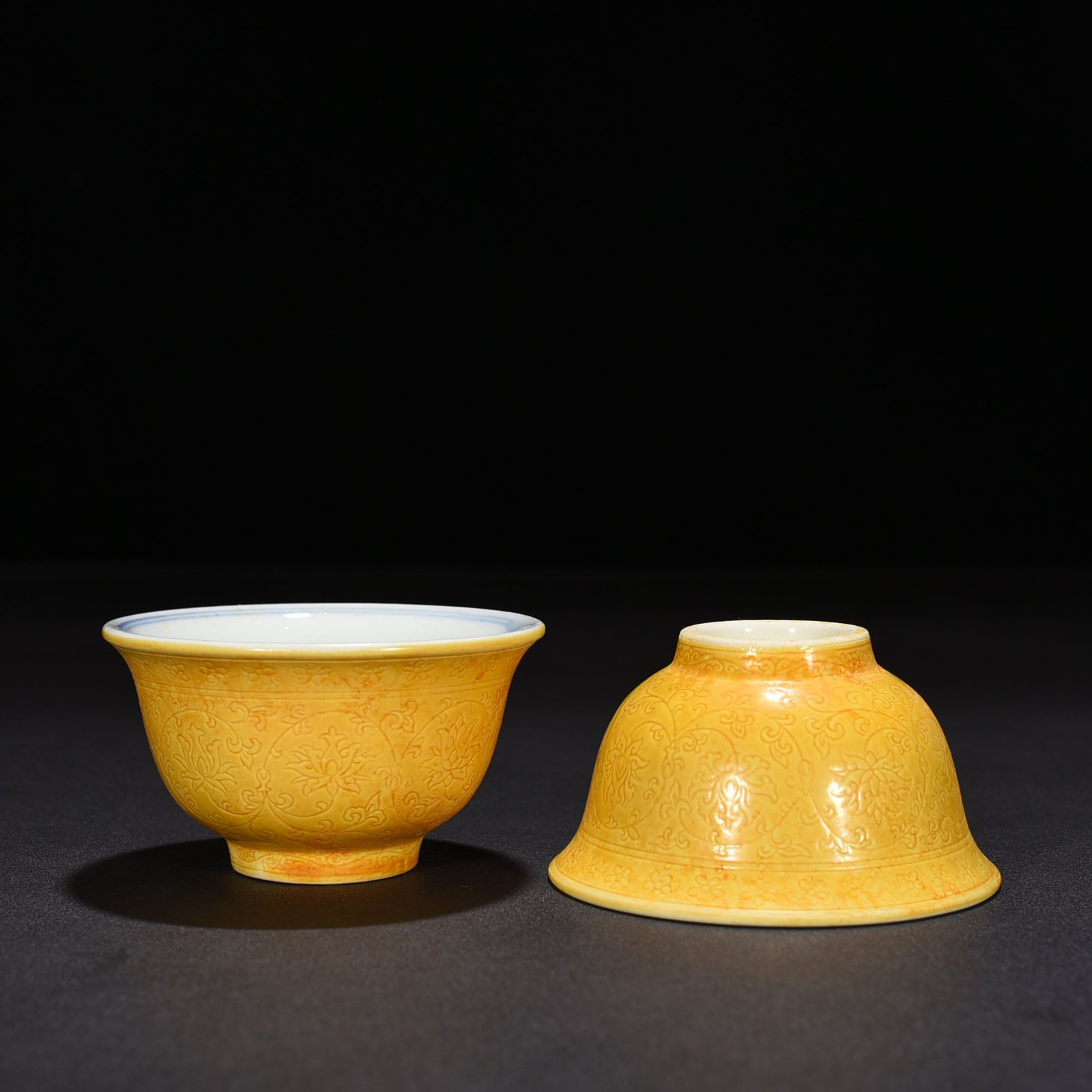 Ming Dynasty Yongle delicate yellow glaze carved lotus pressed hand cup
