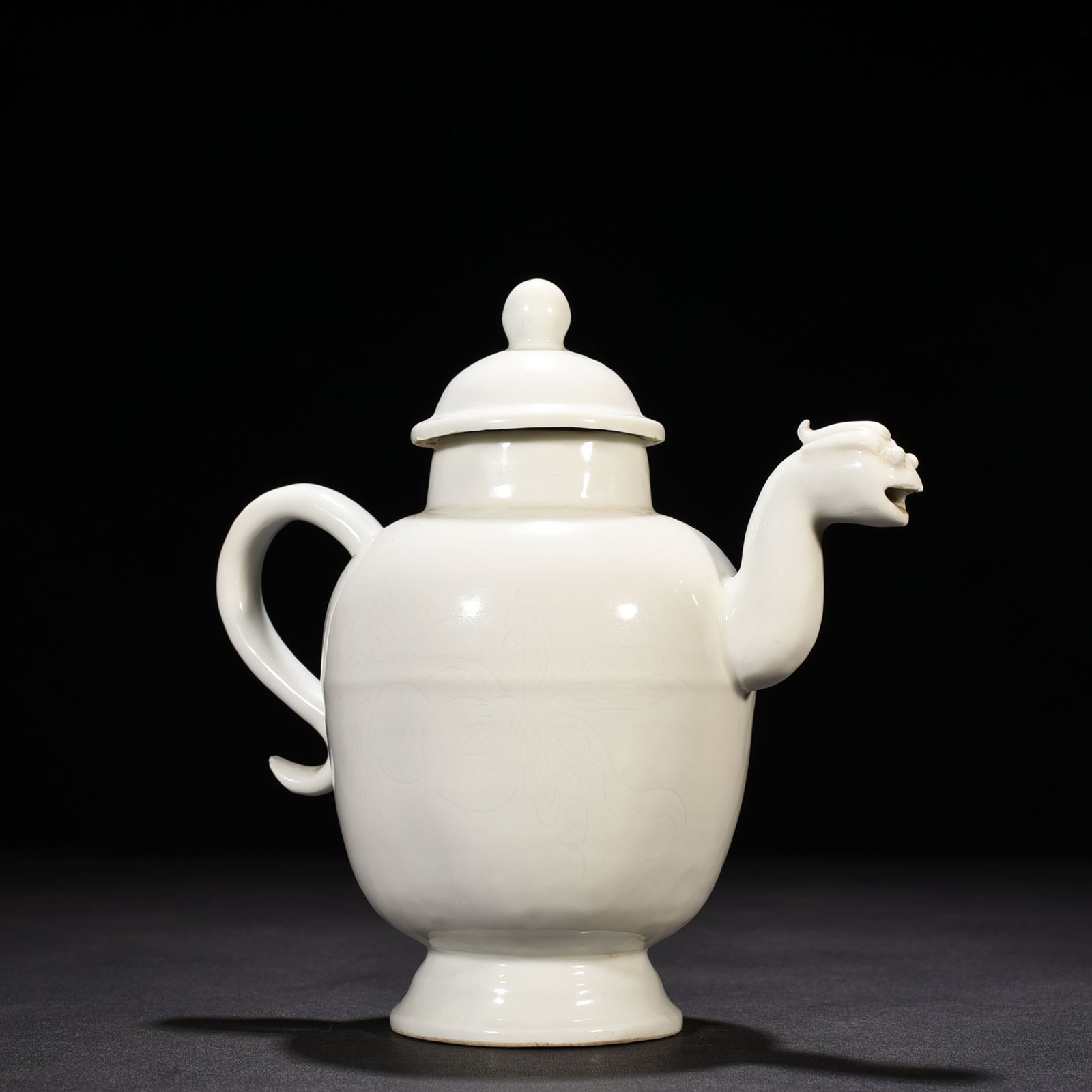 Ming Dynasty Yongle sweet white glaze secretly carved phoenix head ewer