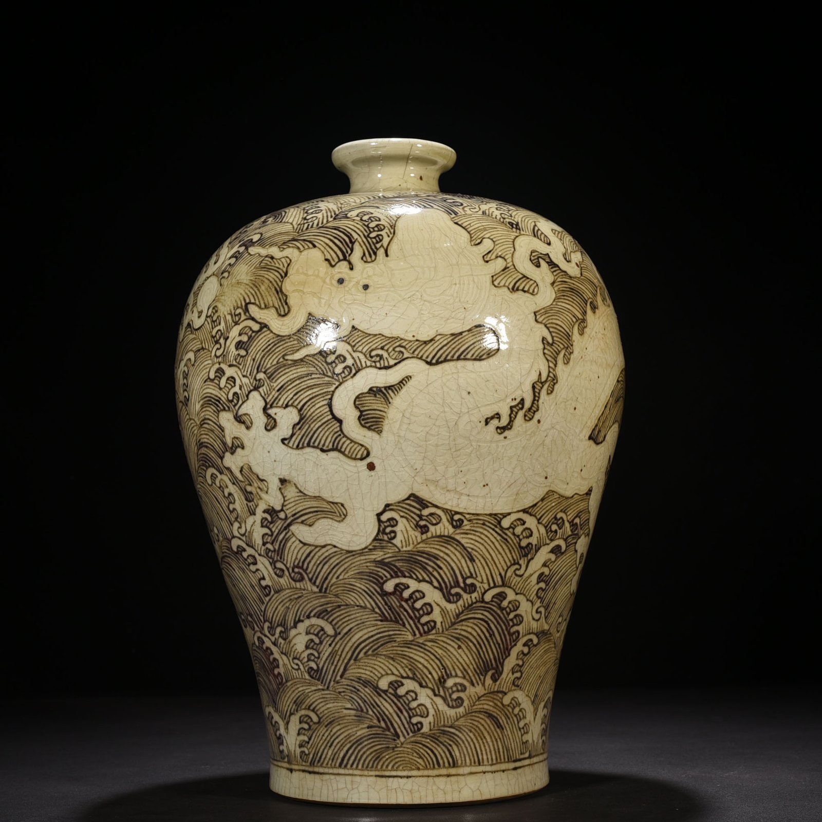 Ming Dynasty Yongle red underglaze plum vase with sea water dragon