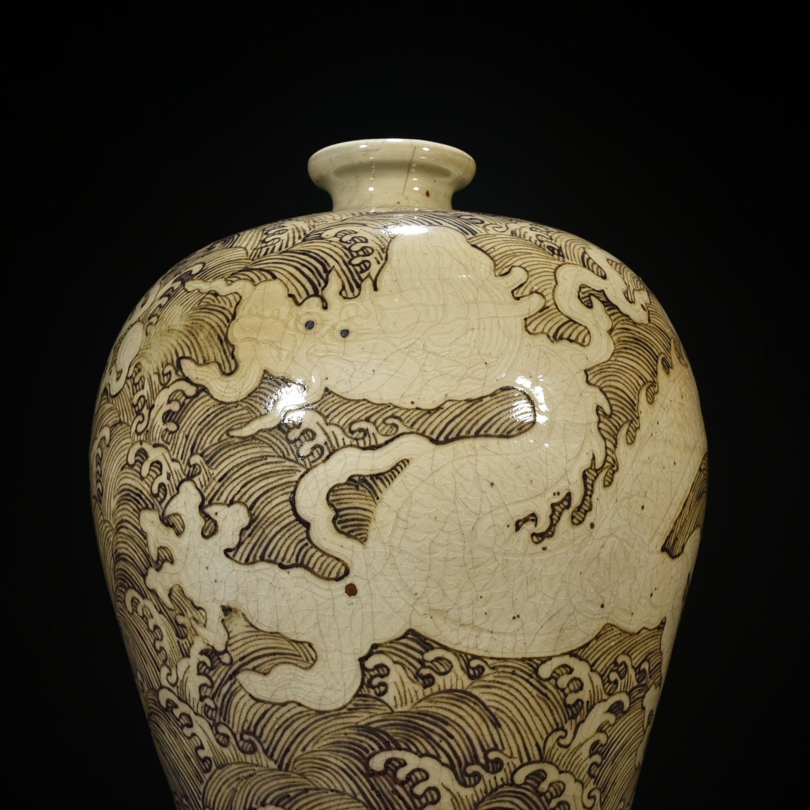 Ming Dynasty Yongle red underglaze plum vase with sea water dragon