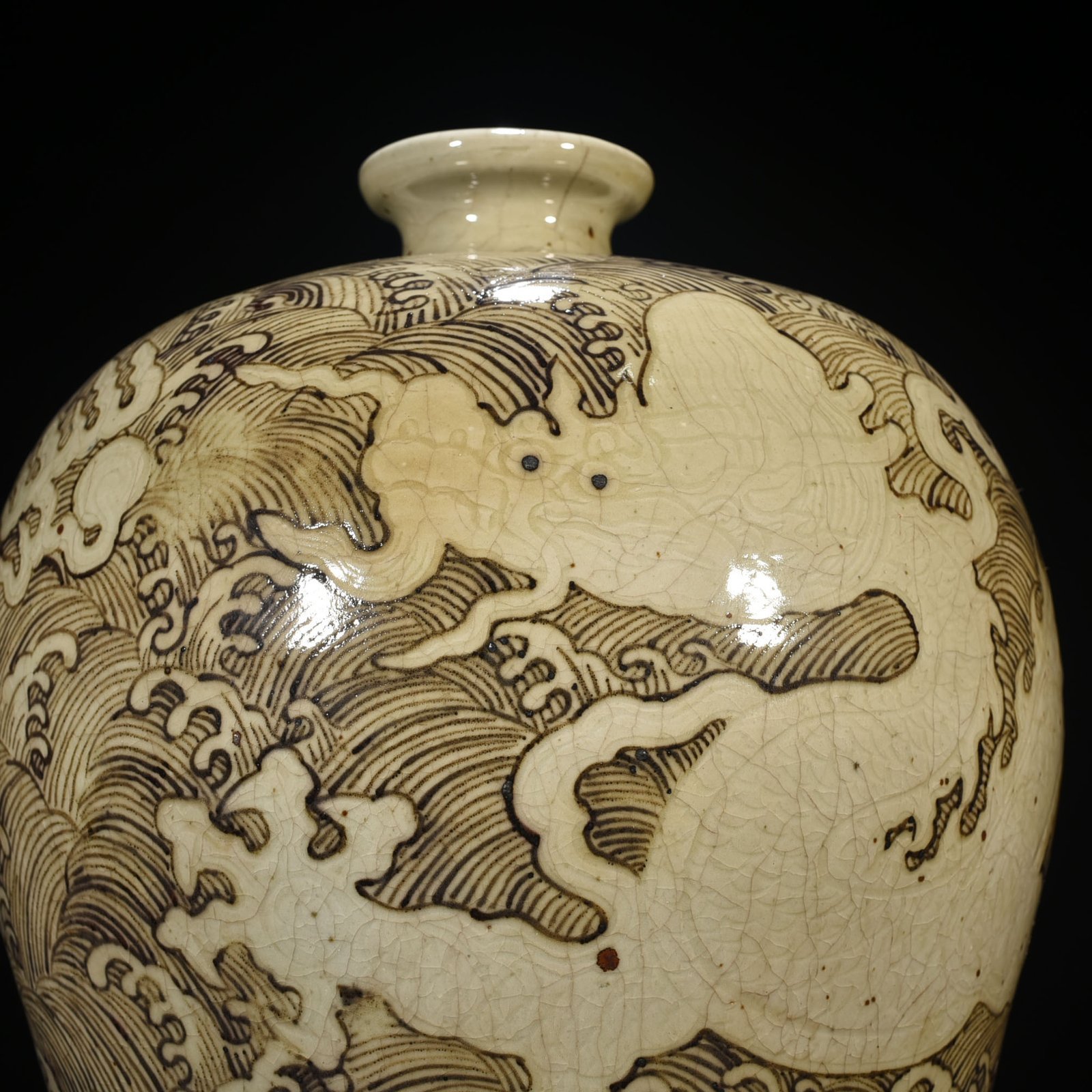 Ming Dynasty Yongle red underglaze plum vase with sea water dragon