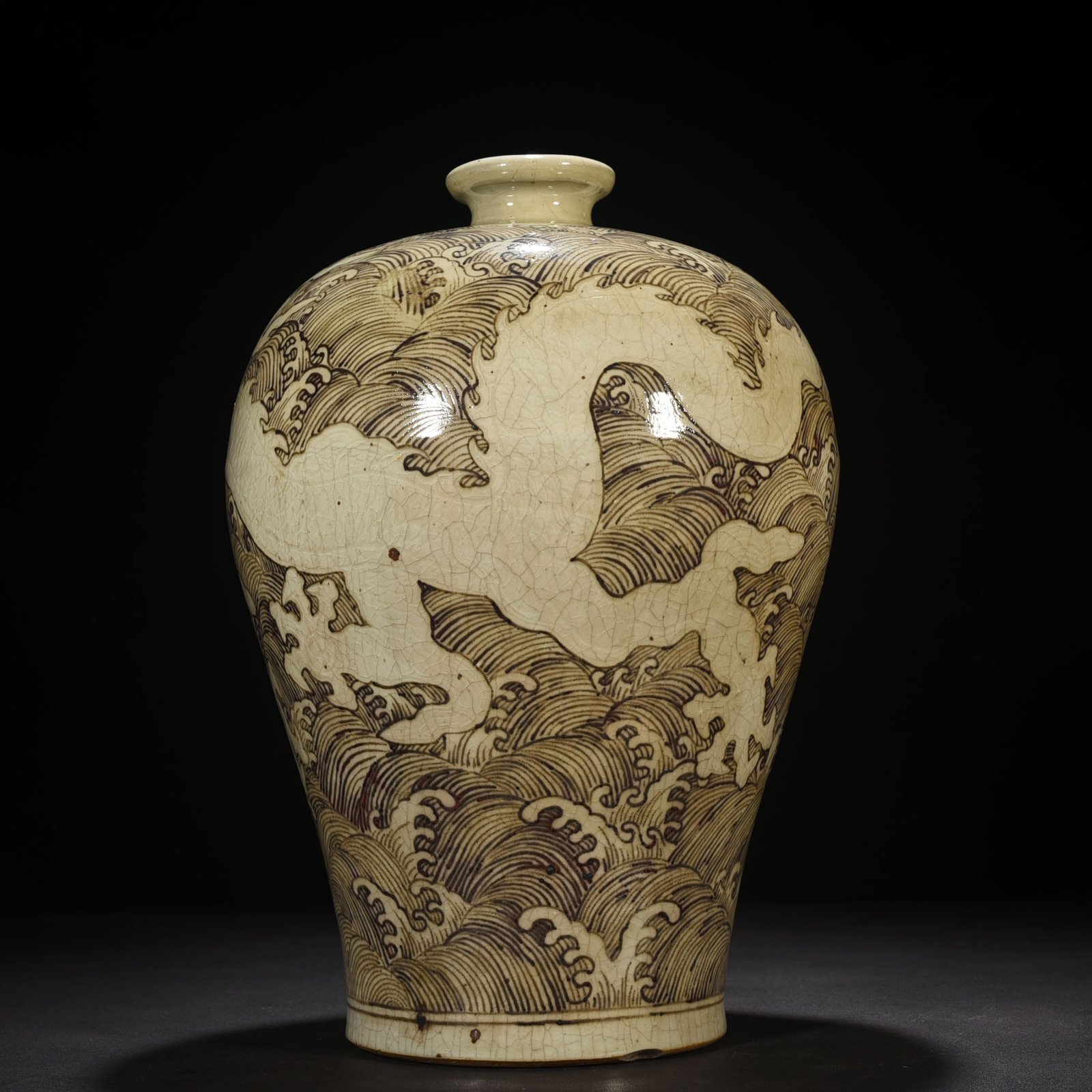 Ming Dynasty Yongle red underglaze plum vase with sea water dragon