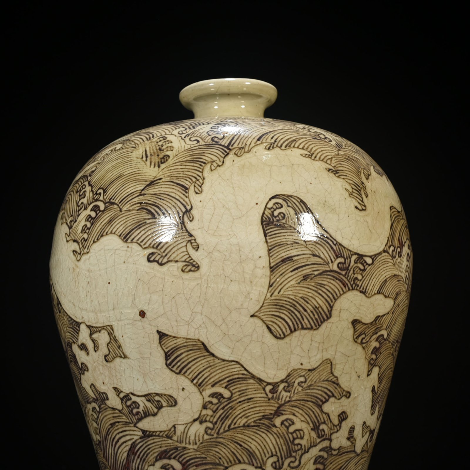 Ming Dynasty Yongle red underglaze plum vase with sea water dragon