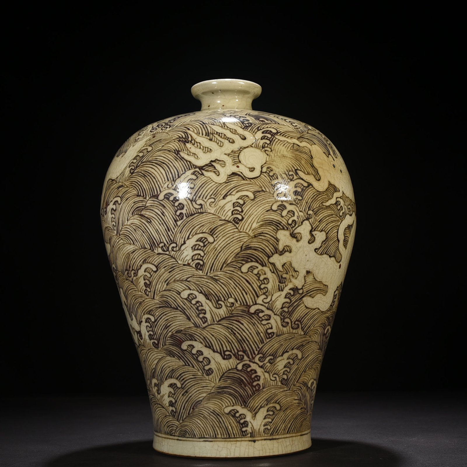 Ming Dynasty Yongle red underglaze plum vase with sea water dragon