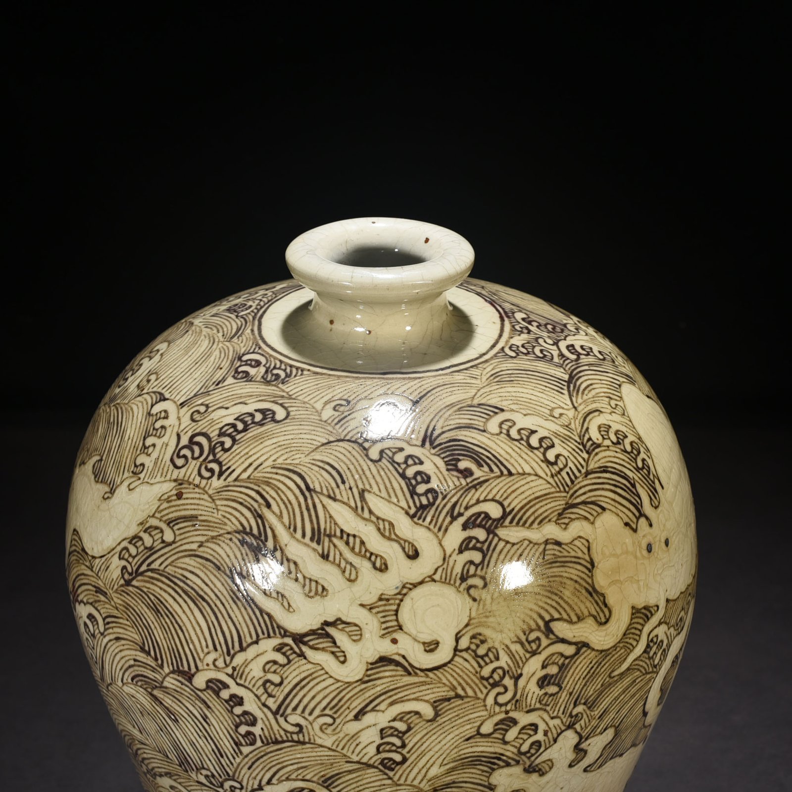 Ming Dynasty Yongle red underglaze plum vase with sea water dragon