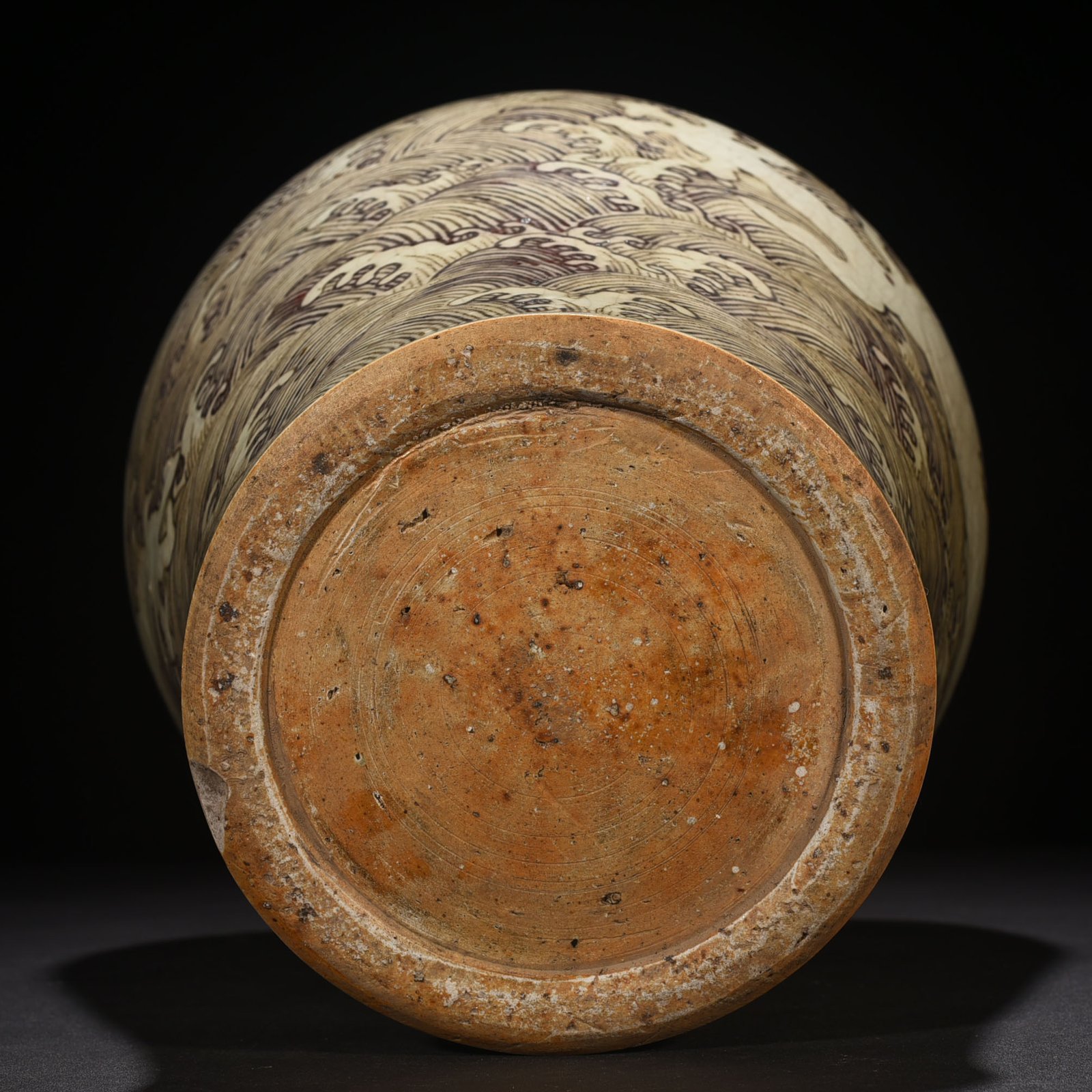 Ming Dynasty Yongle red underglaze plum vase with sea water dragon