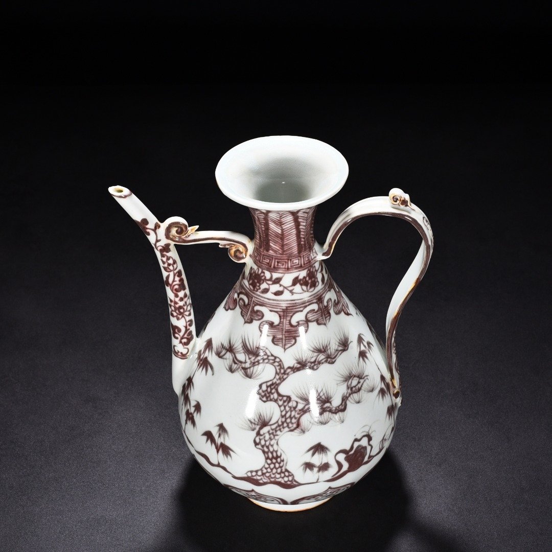 Ming Dynasty Yongle underglaze red pine bamboo and plum ewer