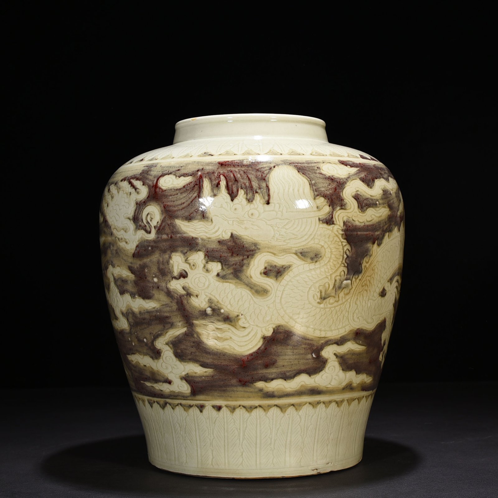 Ming Dynasty Yongle underglaze red carved dragon jar
