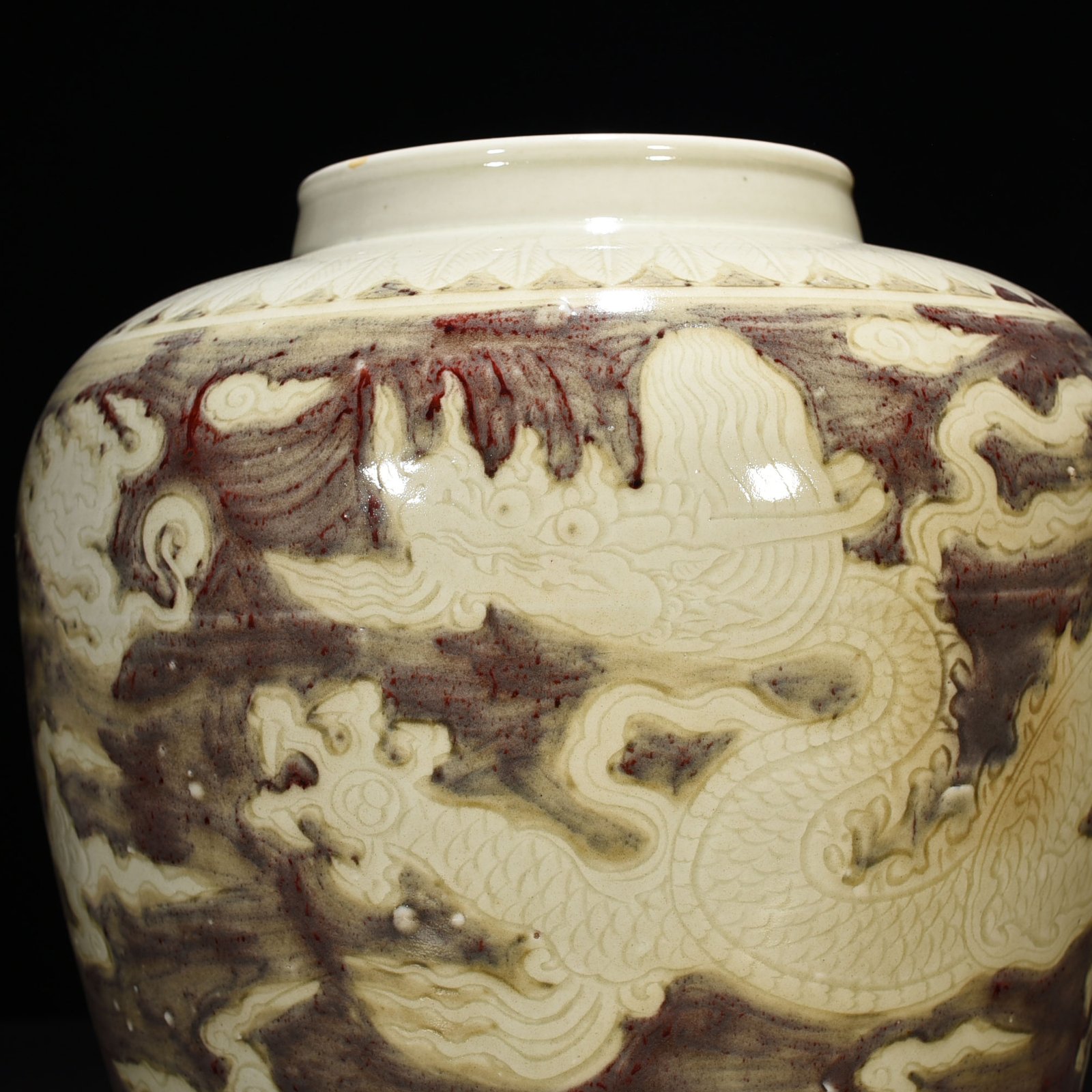 Ming Dynasty Yongle underglaze red carved dragon jar