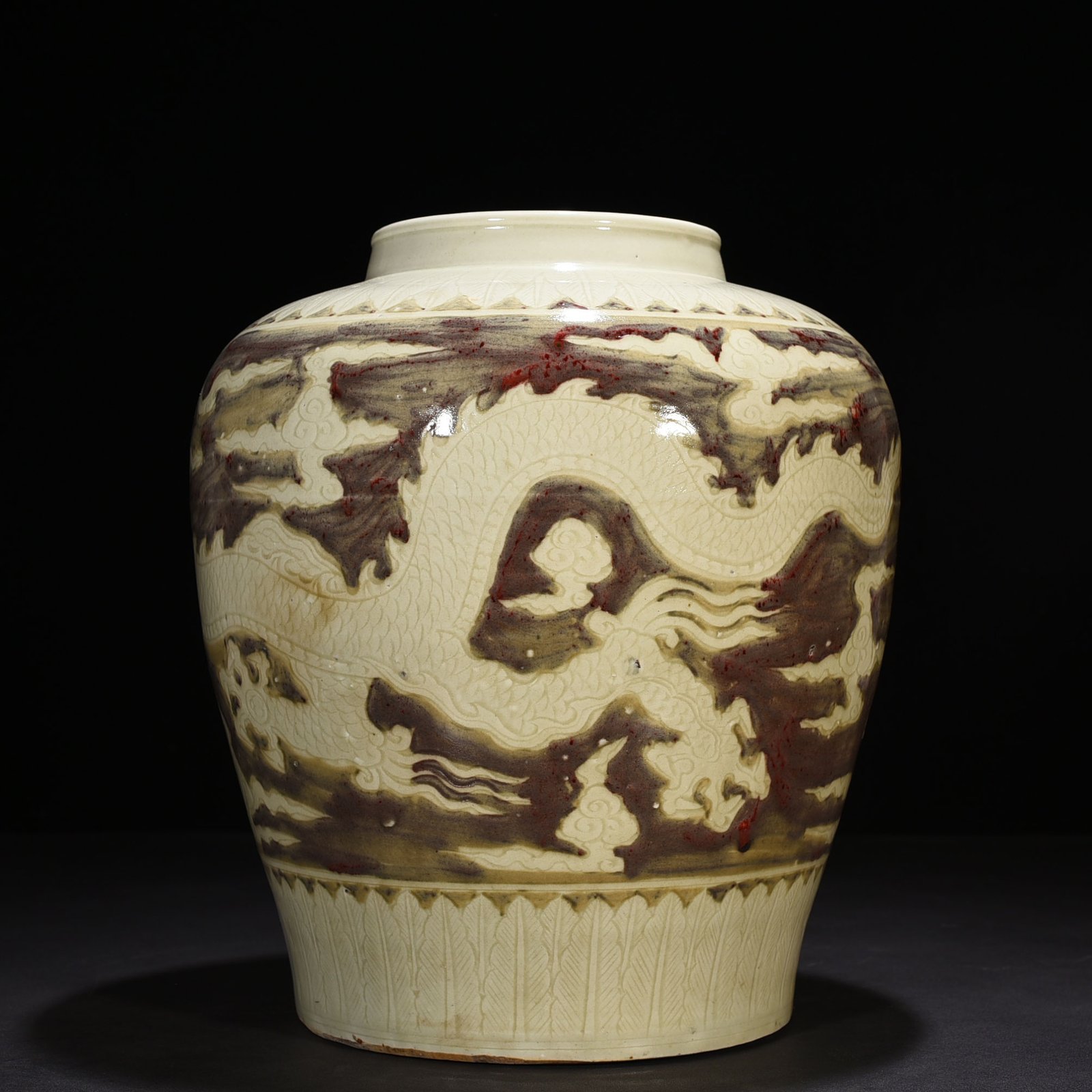 Ming Dynasty Yongle underglaze red carved dragon jar