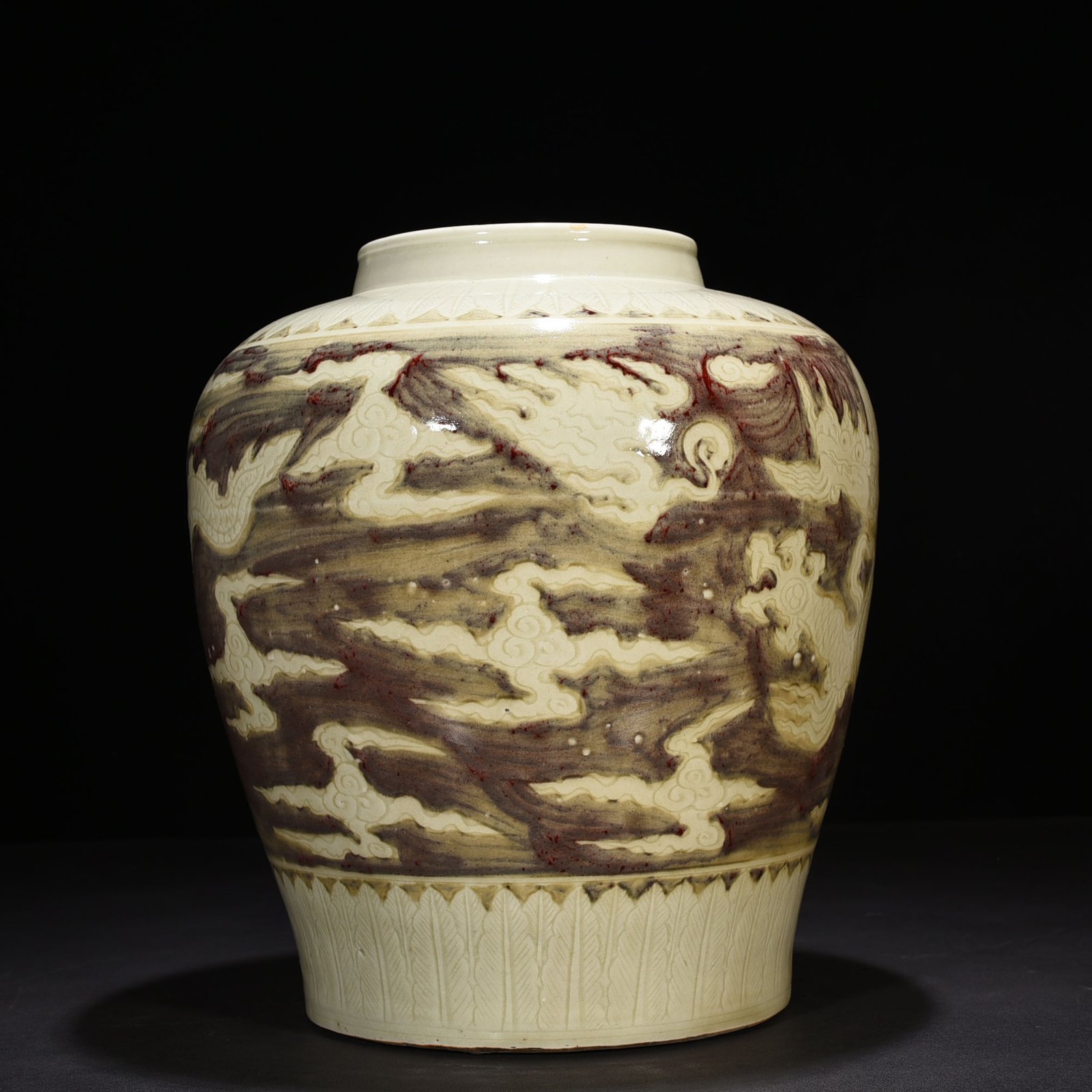 Ming Dynasty Yongle underglaze red carved dragon jar