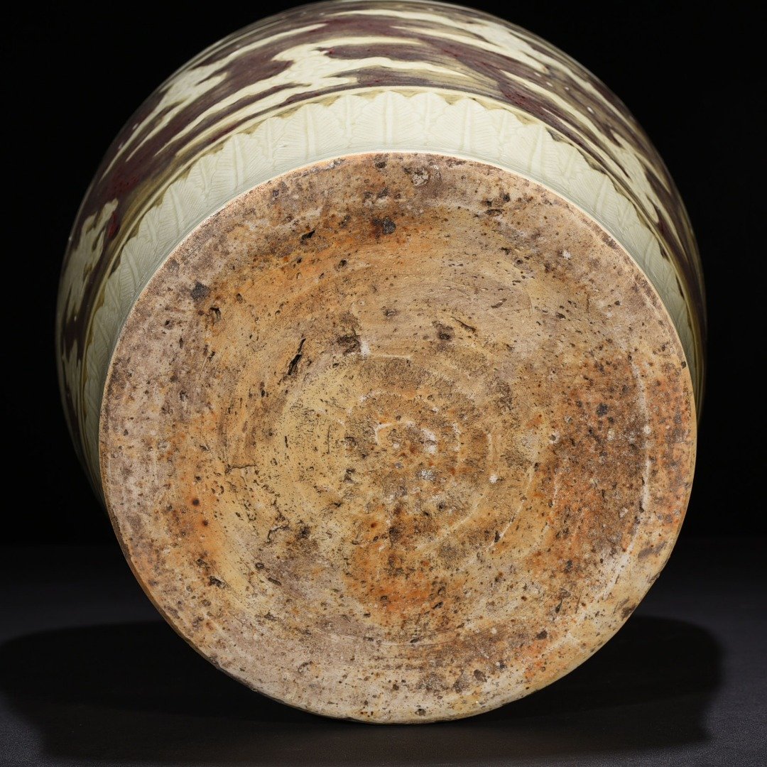 Ming Dynasty Yongle underglaze red carved dragon jar