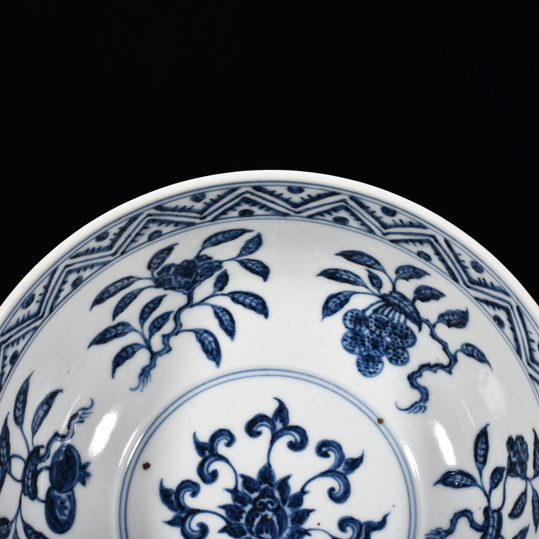 Ming Dynasty Yongle blue and white bowl with folded branches flowers and fruits