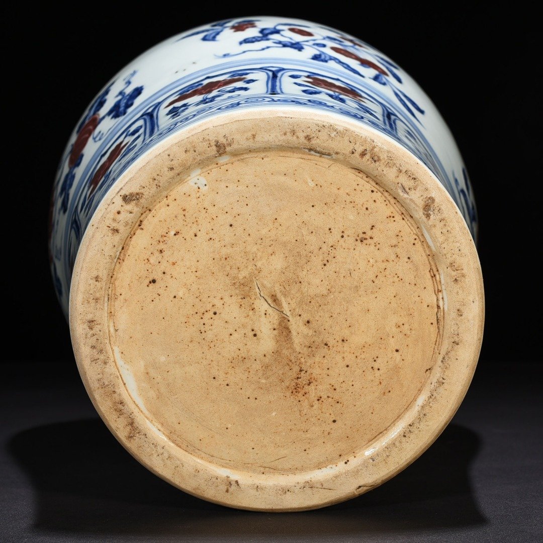 Ming Dynasty Yongle blue and white underglaze red plum vase with folded branches