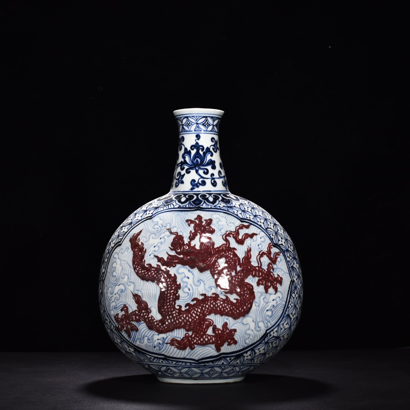Ming Dynasty Yongle blue and white underglaze red sea dragon flat vase