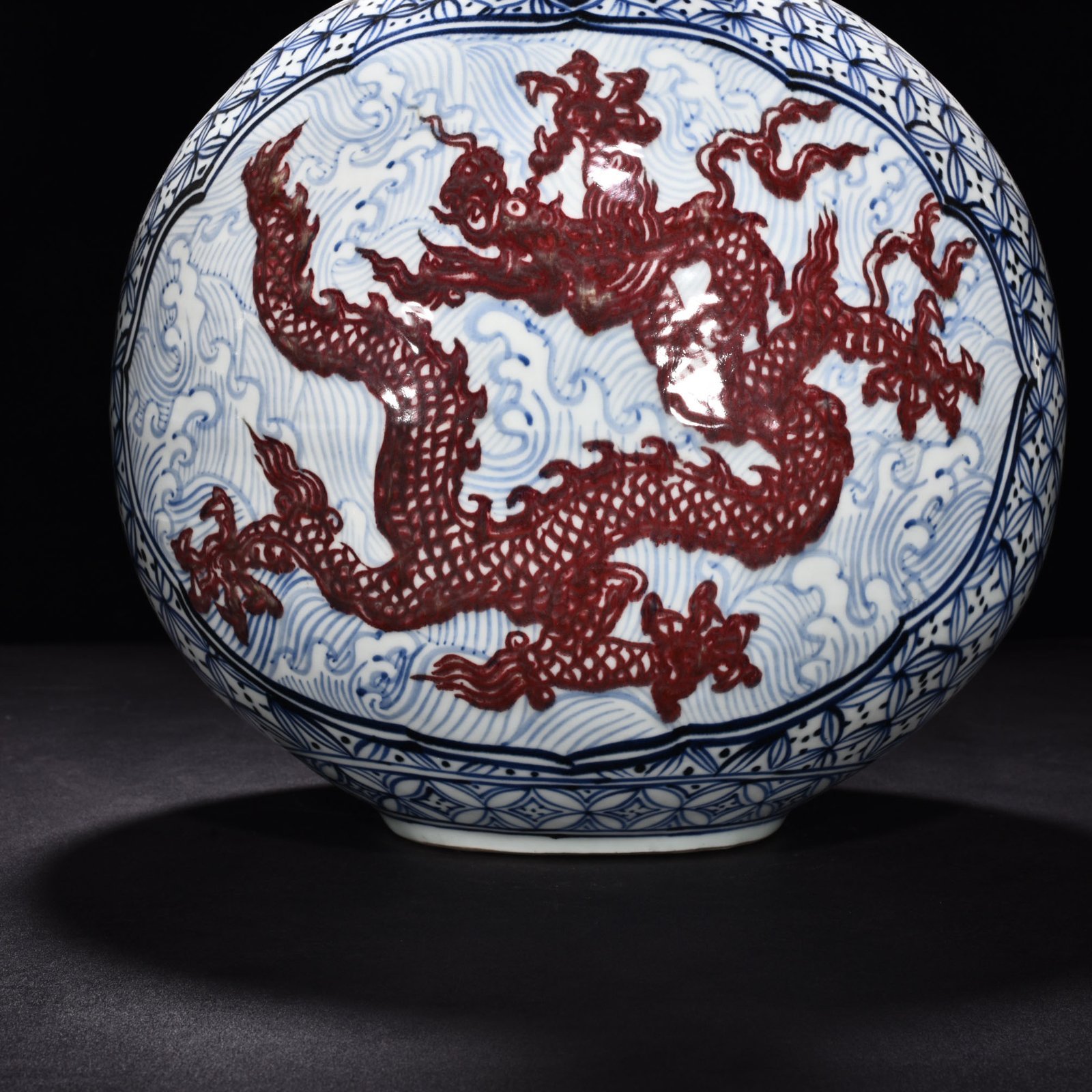 Ming Dynasty Yongle blue and white underglaze red sea dragon flat vase