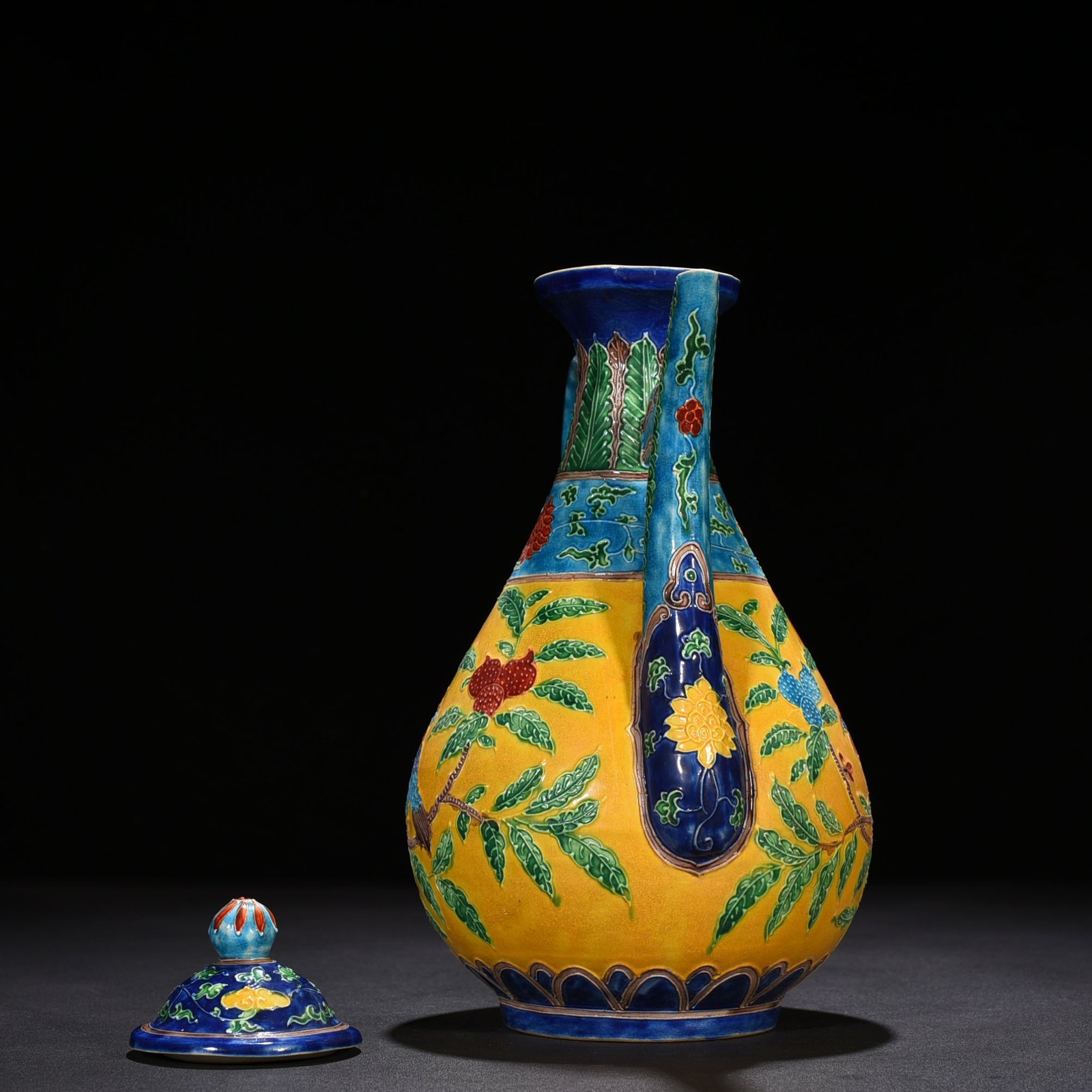 Ming Dynasty Yongle yellow ground enamel ewer with folded branches flowers and birds