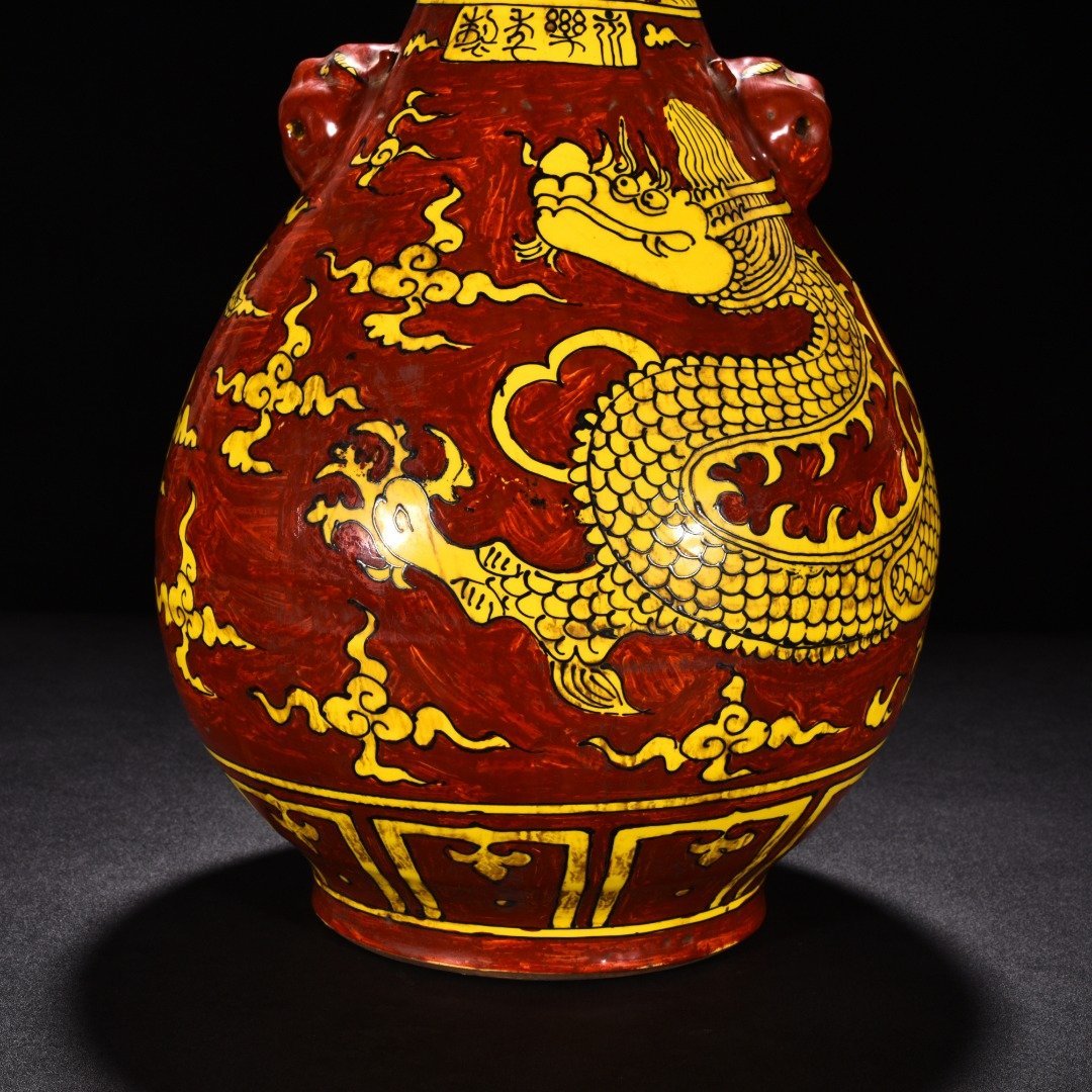 Ming Dynasty Yongle yellow ground red glaze cloud and dragon jade pot spring vase