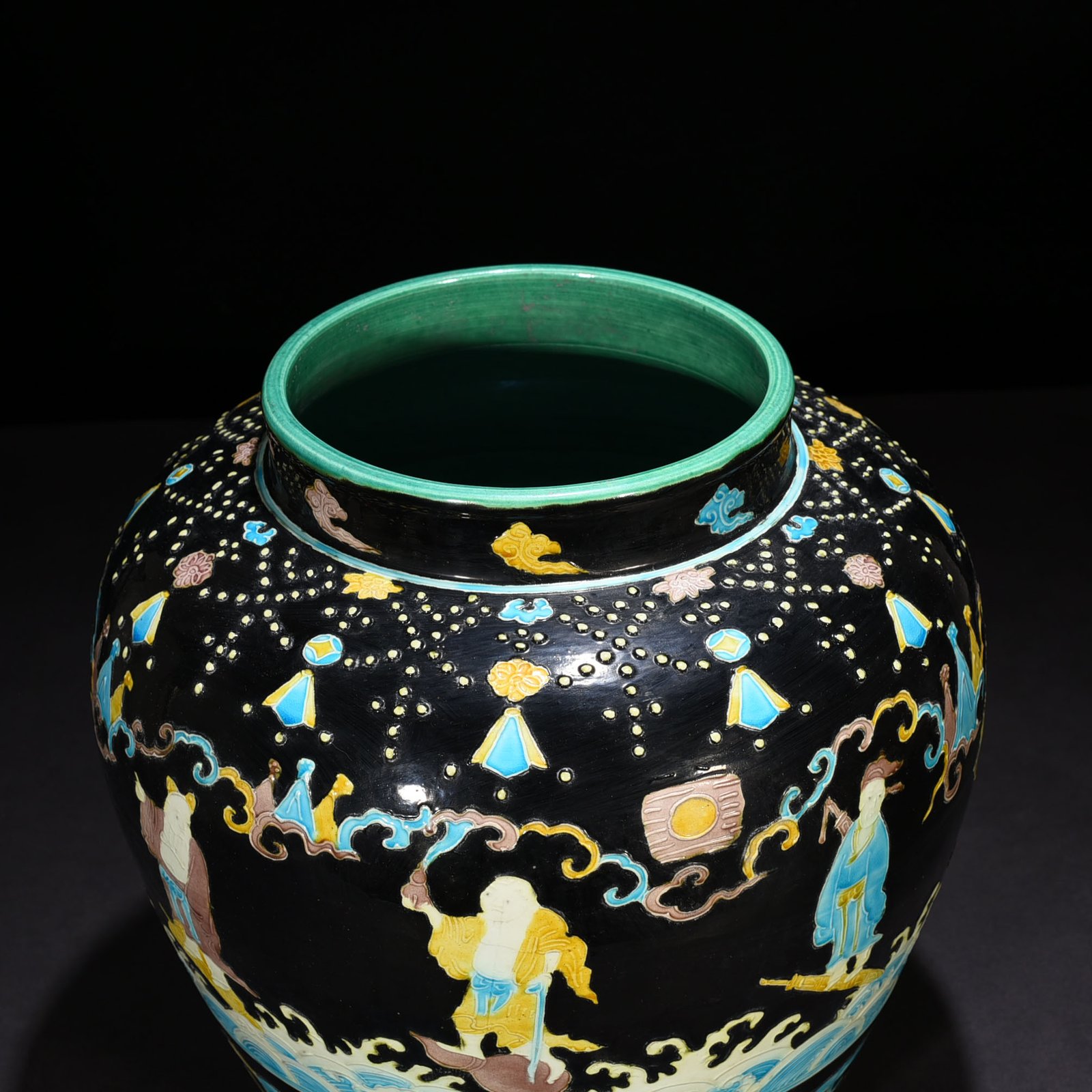 Ming Dynasty Yongle black ground enamel jar with eight immortals figures