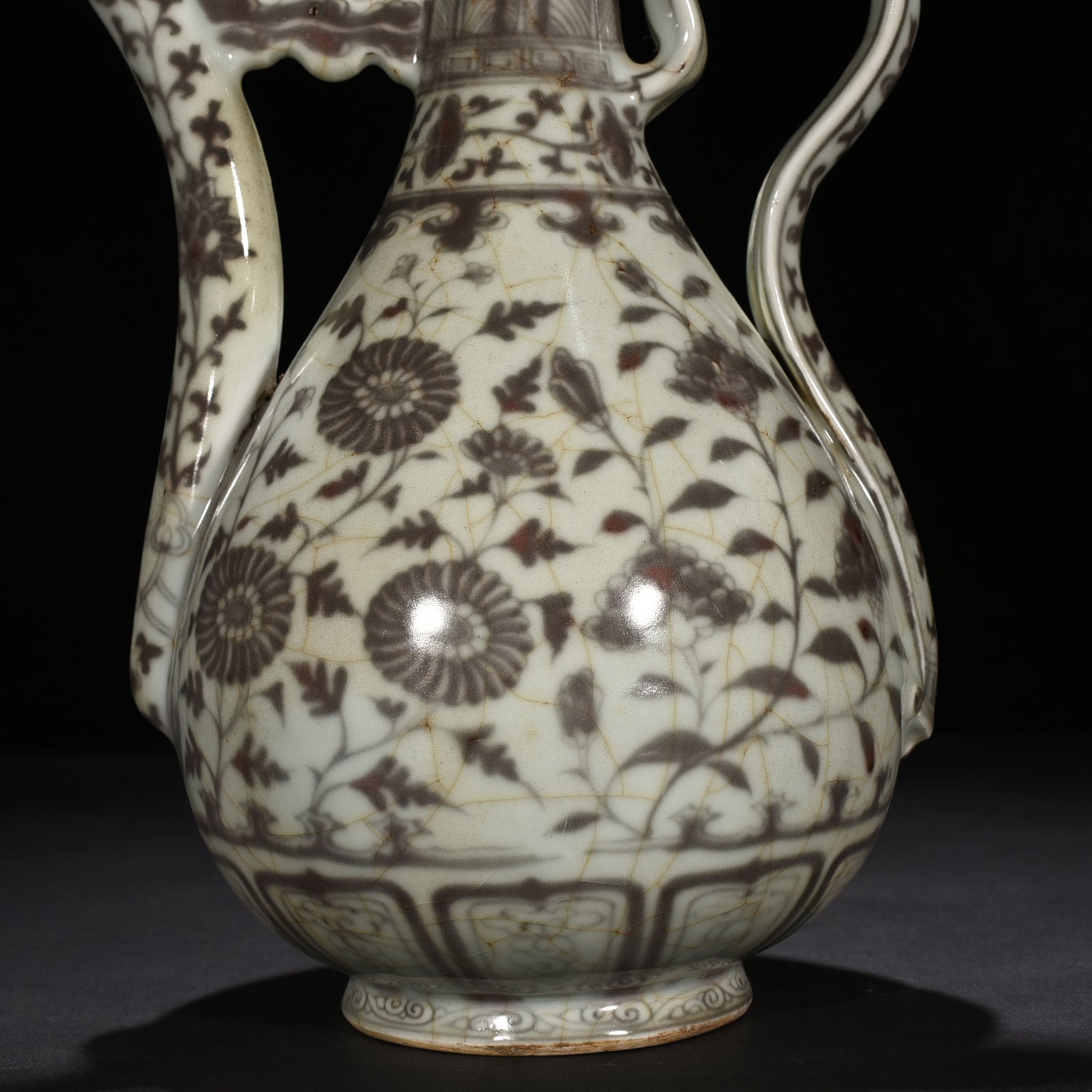 Ming Dynasty Hongwu underglaze red ewer with four seasons flower