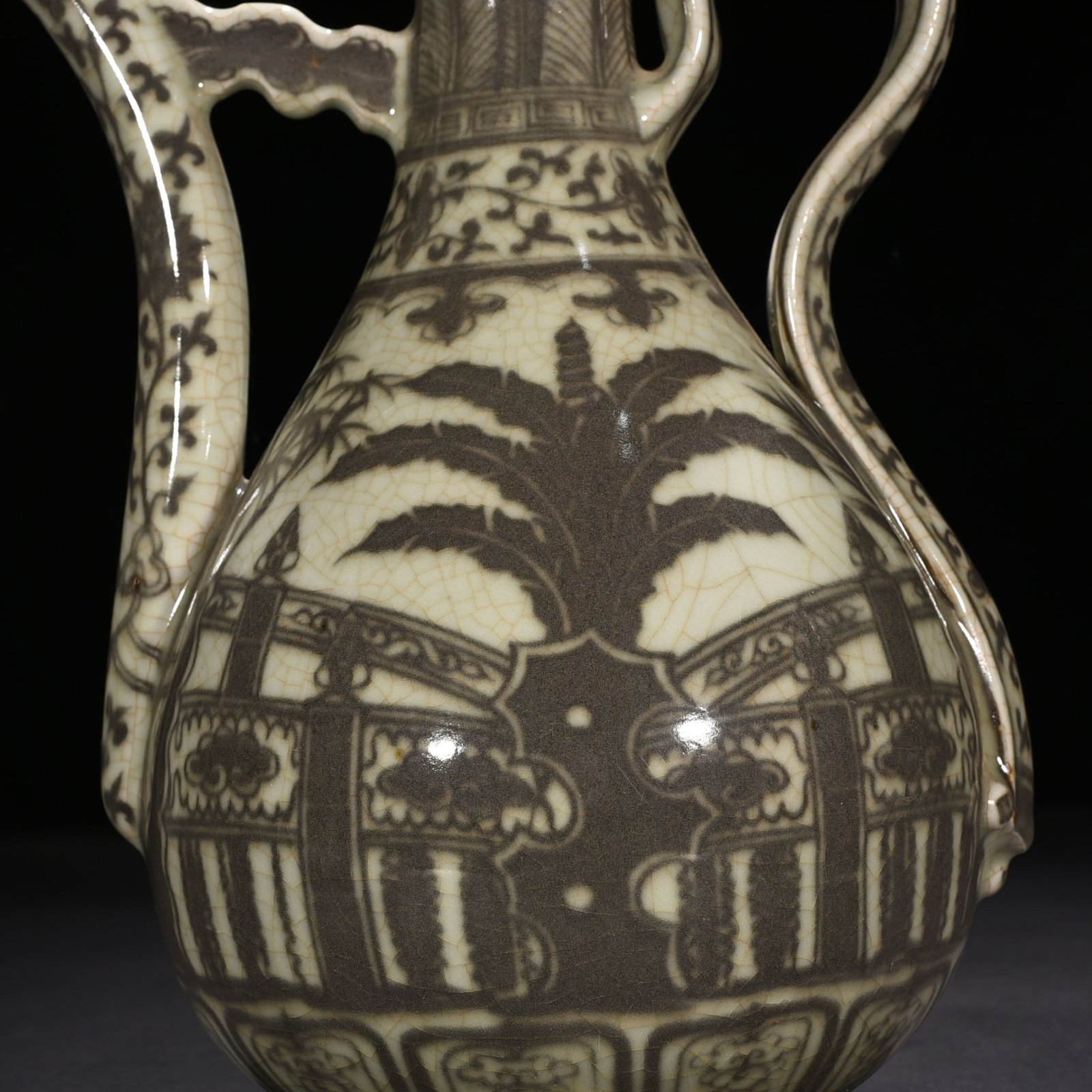 Ming Dynasty Hongwu underglaze red lake stone ewer with banana leaf