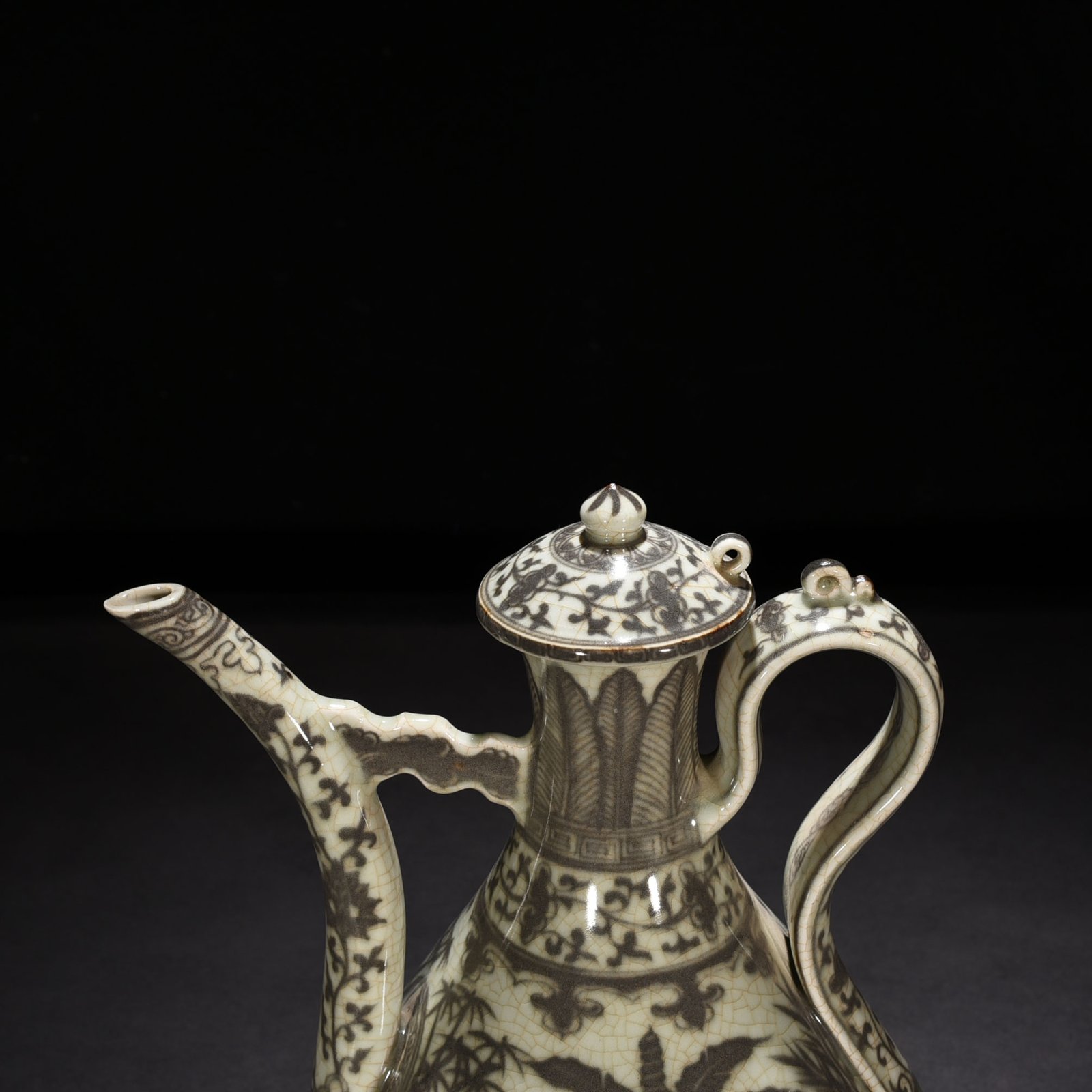 Ming Dynasty Hongwu underglaze red lake stone ewer with banana leaf