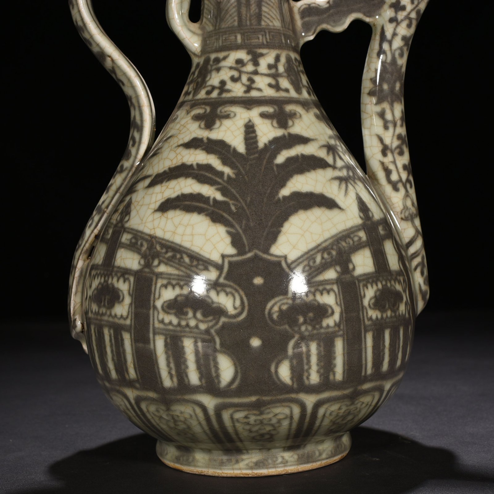 Ming Dynasty Hongwu underglaze red lake stone ewer with banana leaf
