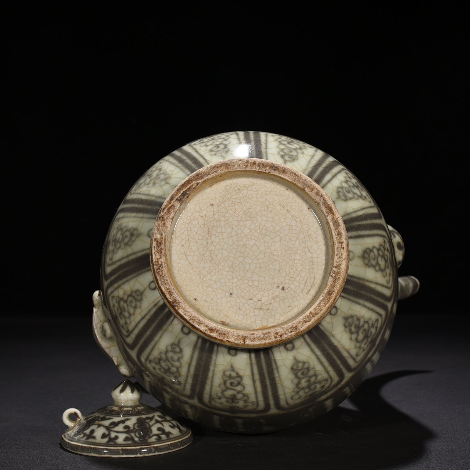 Ming Dynasty Hongwu underglaze red lake stone ewer with banana leaf