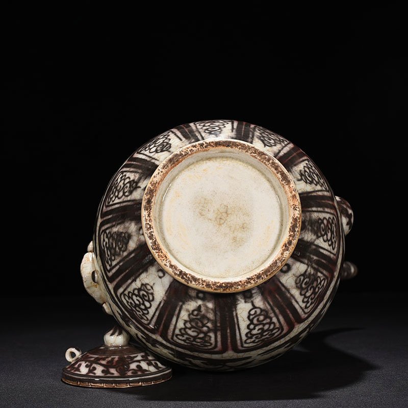 Ming Dynasty Hongwu underglaze red flower ewer