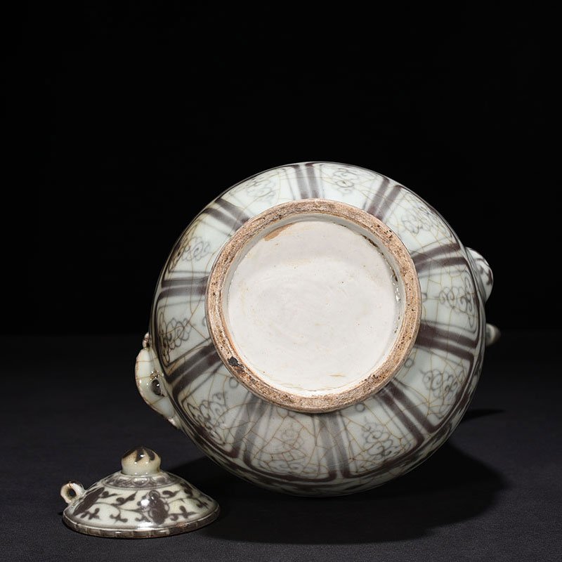 Ming Dynasty Hongwu underglaze red flower ewer