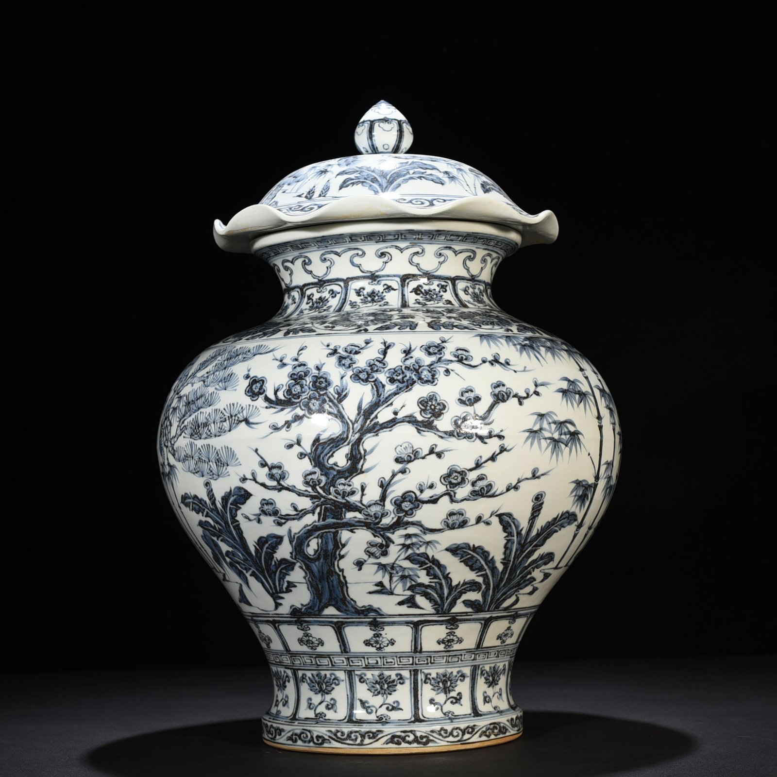 Ming Dynasty Hongwu blue and white pine bamboo and plum lotus leaf lid jar