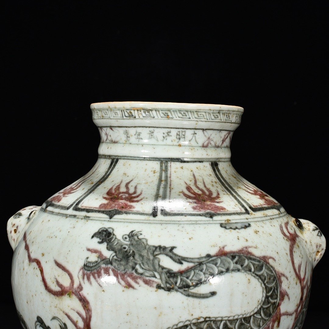 Ming Dynasty Hongwu blue and white underglaze red cloud dragon and tiger head jar