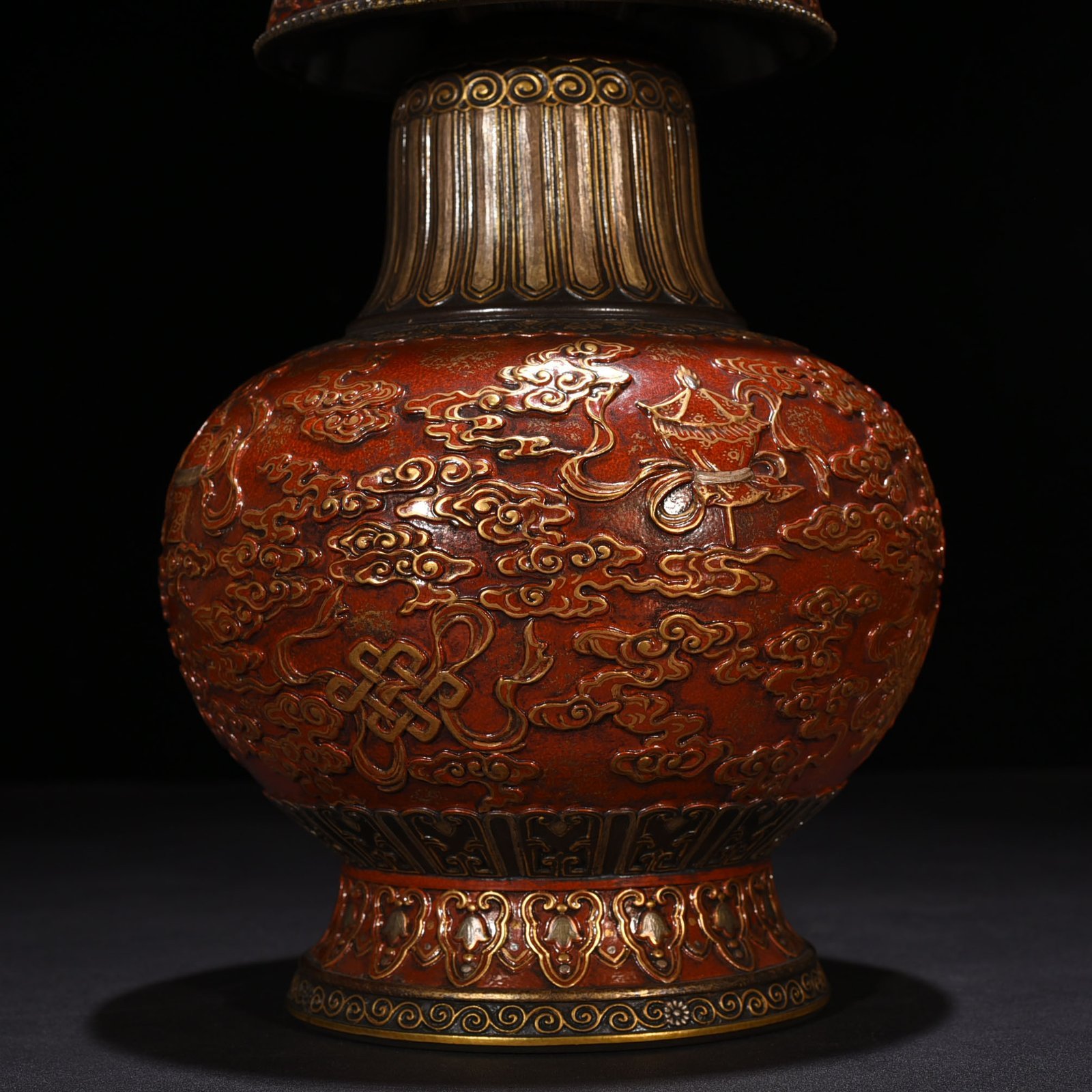 Qing Dynasty Qianlong bronze glazed alum red gold engraved eight treasures military holding