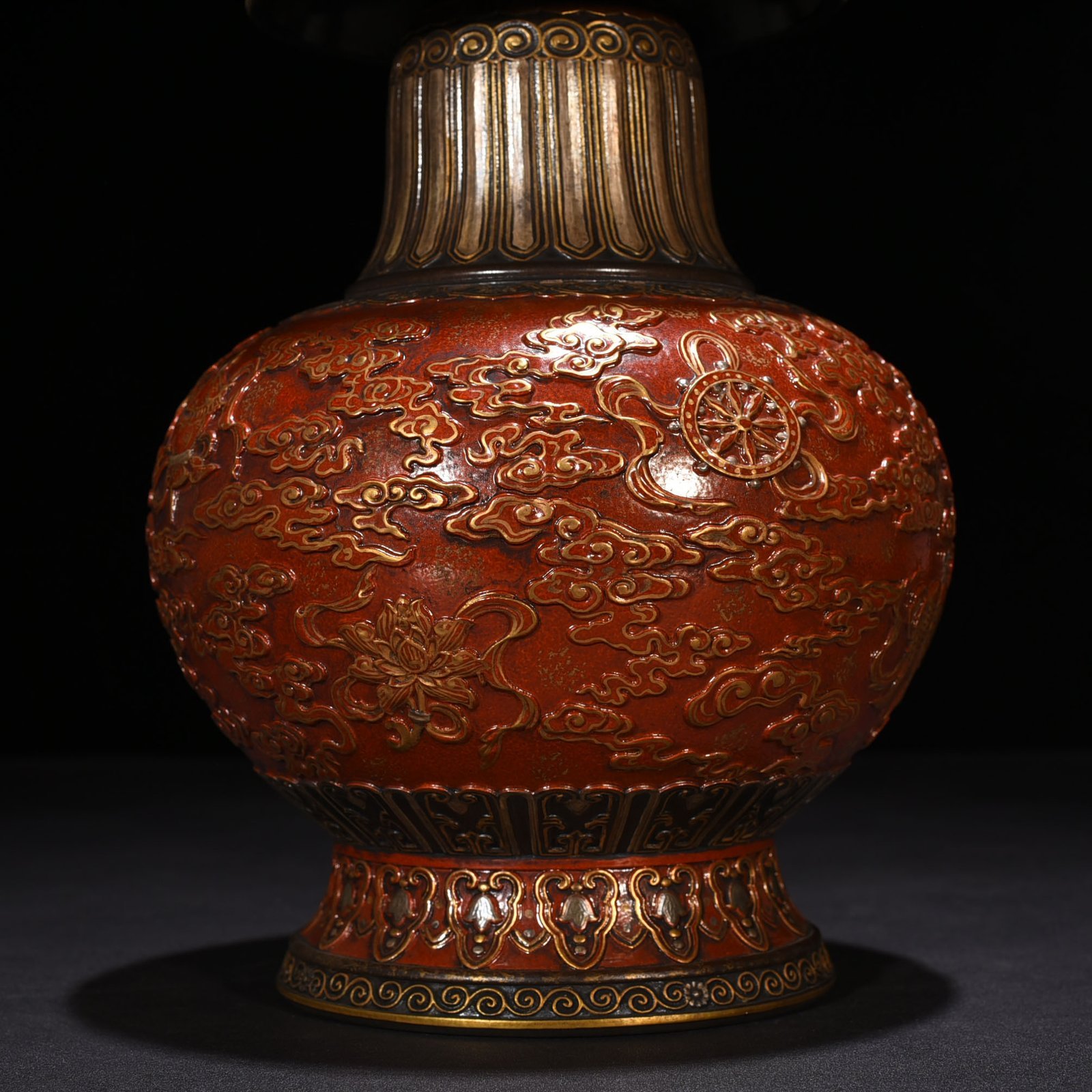 Qing Dynasty Qianlong bronze glazed alum red gold engraved eight treasures military holding