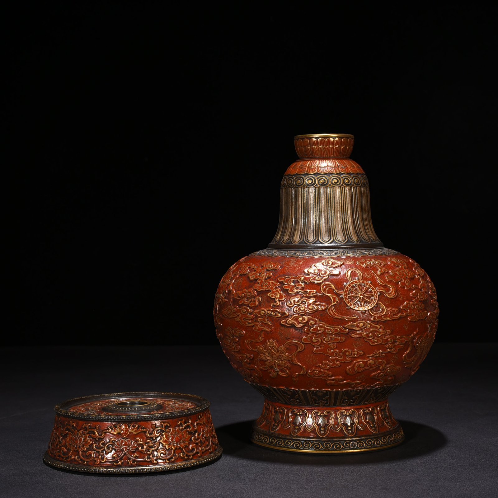 Qing Dynasty Qianlong bronze glazed alum red gold engraved eight treasures military holding