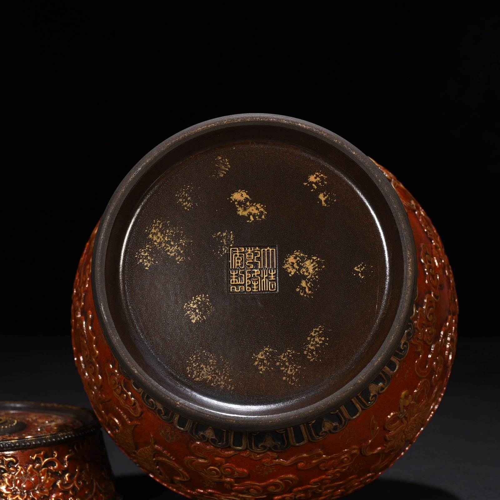 Qing Dynasty Qianlong bronze glazed alum red gold engraved eight treasures military holding