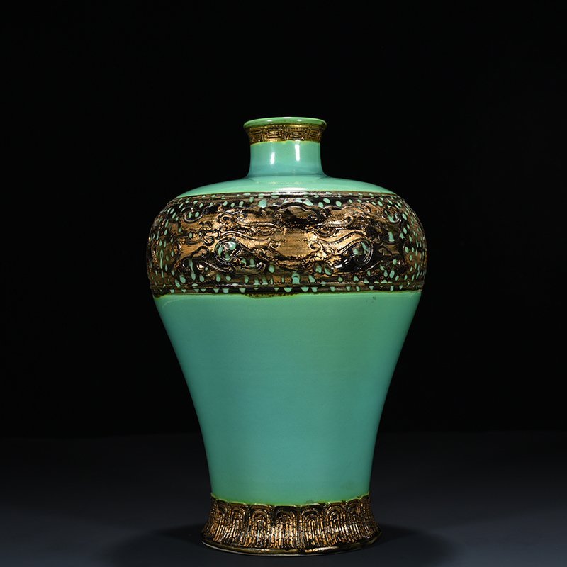 Qing Dynasty Qianlong turquoise green bronze glaze carved animal mask plum vase