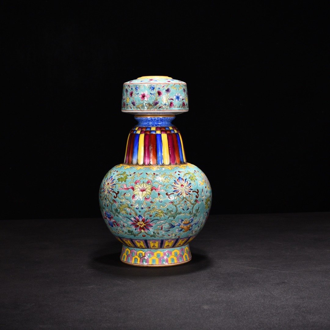 Qing Dynasty Qianlong turquoise green ground enamel colored lotus holder Bianba vase