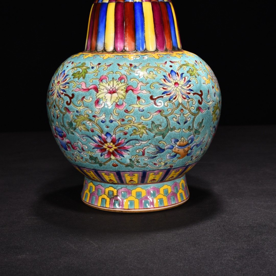 Qing Dynasty Qianlong turquoise green ground enamel colored lotus holder Bianba vase