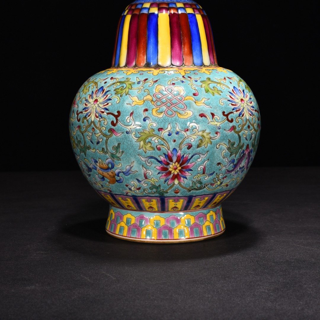 Qing Dynasty Qianlong turquoise green ground enamel colored lotus holder Bianba vase