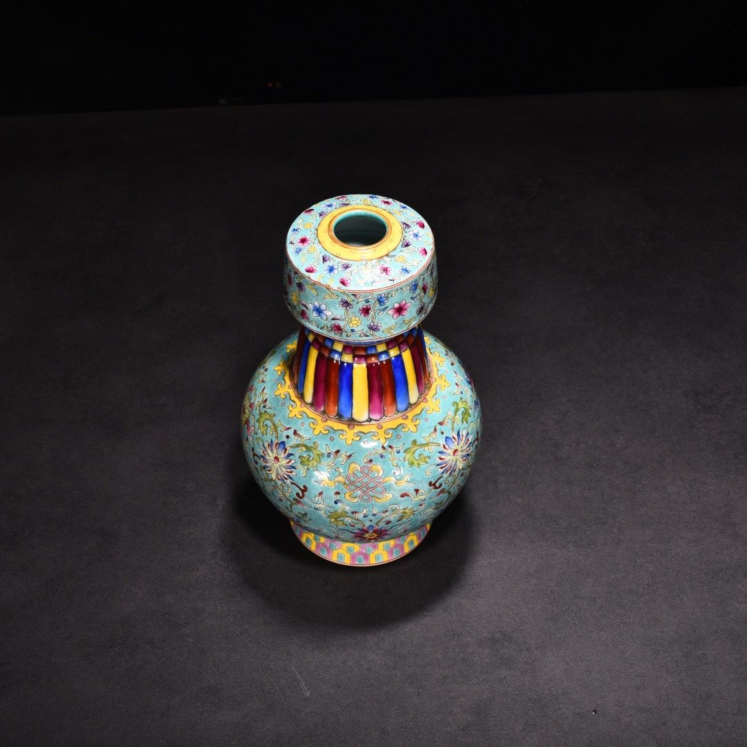 Qing Dynasty Qianlong turquoise green ground enamel colored lotus holder Bianba vase