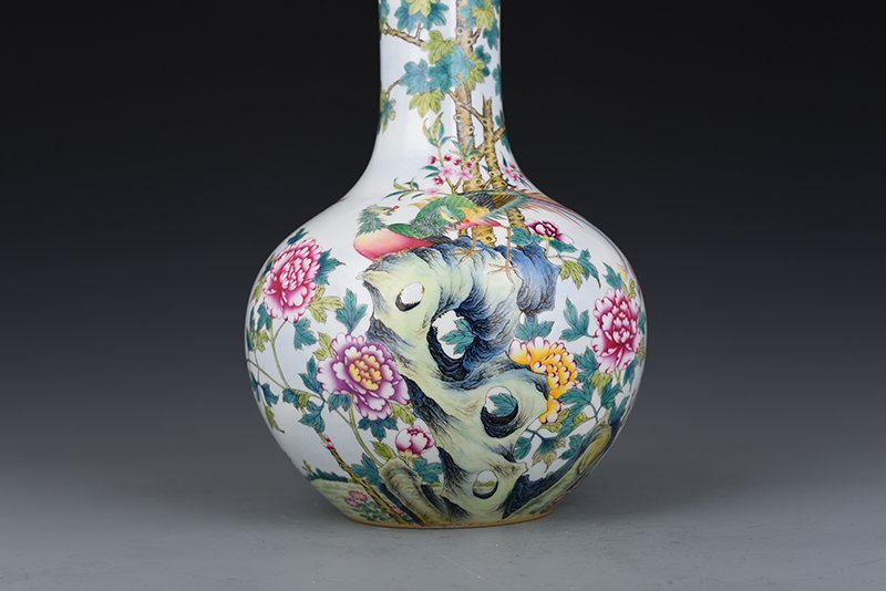 Qing Dynasty Qianlong enamel peacock peony celestial sphere vase