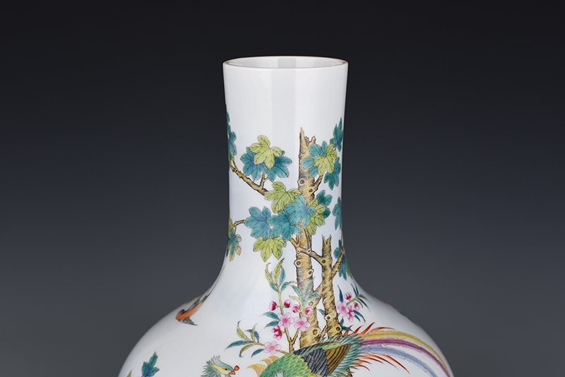 Qing Dynasty Qianlong enamel peacock peony celestial sphere vase