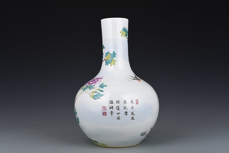 Qing Dynasty Qianlong enamel peacock peony celestial sphere vase