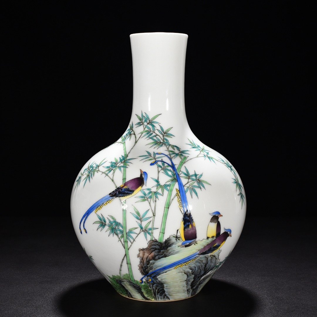 Qing Dynasty Qianlong enamel longevity vase with bird and bamboo