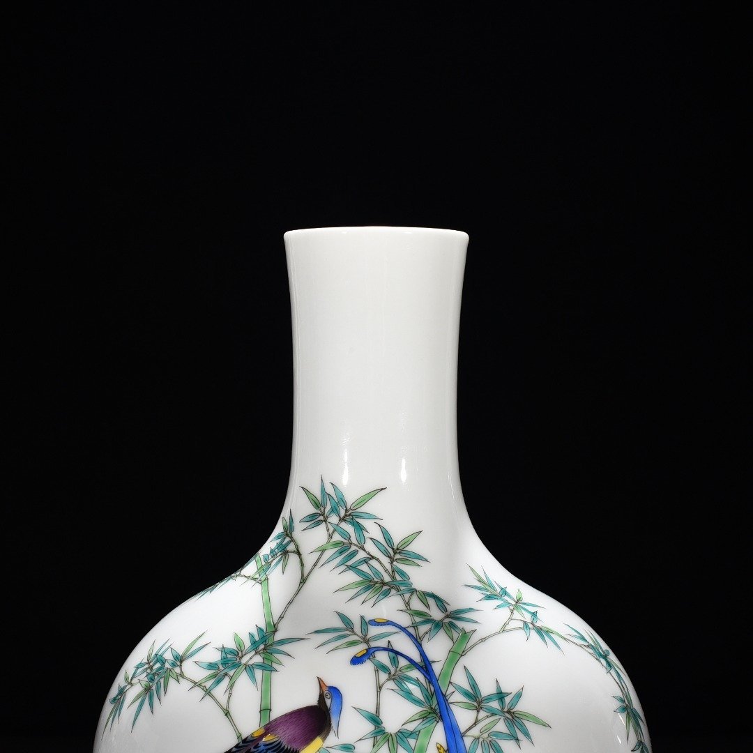Qing Dynasty Qianlong enamel longevity vase with bird and bamboo